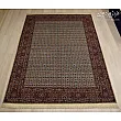 Handwoven 6-meter Rizmahi Mood Carpet with intricate allover design, crafted in Birjand, ideal for luxury home décor.