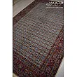 Handwoven 6-meter Rizmahi Mood Carpet with intricate allover design, crafted in Birjand, ideal for luxury home décor.