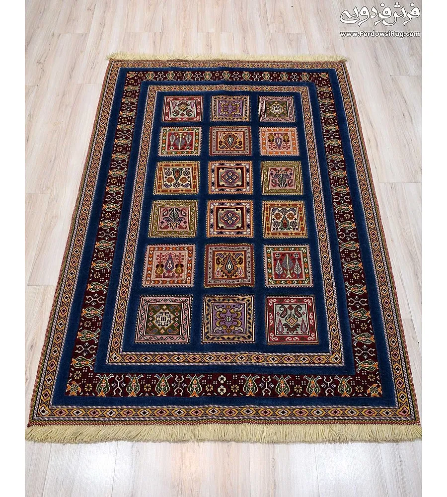 Blue hand-woven carpet rug with intricate clay pattern, Mashhad texture, perfect for home decor and traditional interior styling.