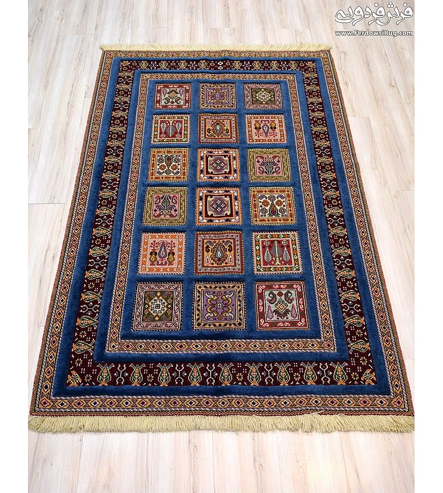Blue hand-woven carpet rug with intricate clay pattern, Mashhad texture, perfect for home decor and traditional interior styling.