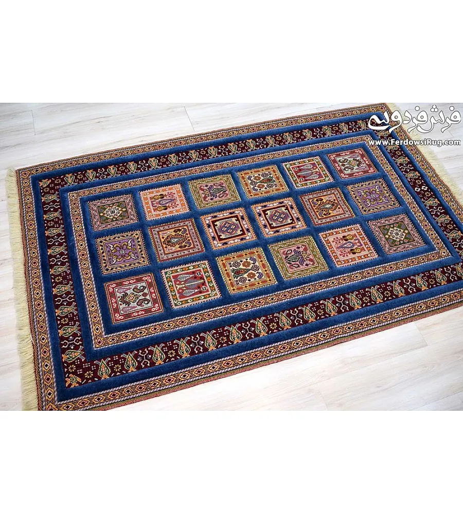 Blue hand-woven carpet rug with intricate clay pattern, Mashhad texture, perfect for home decor and traditional interior styling.