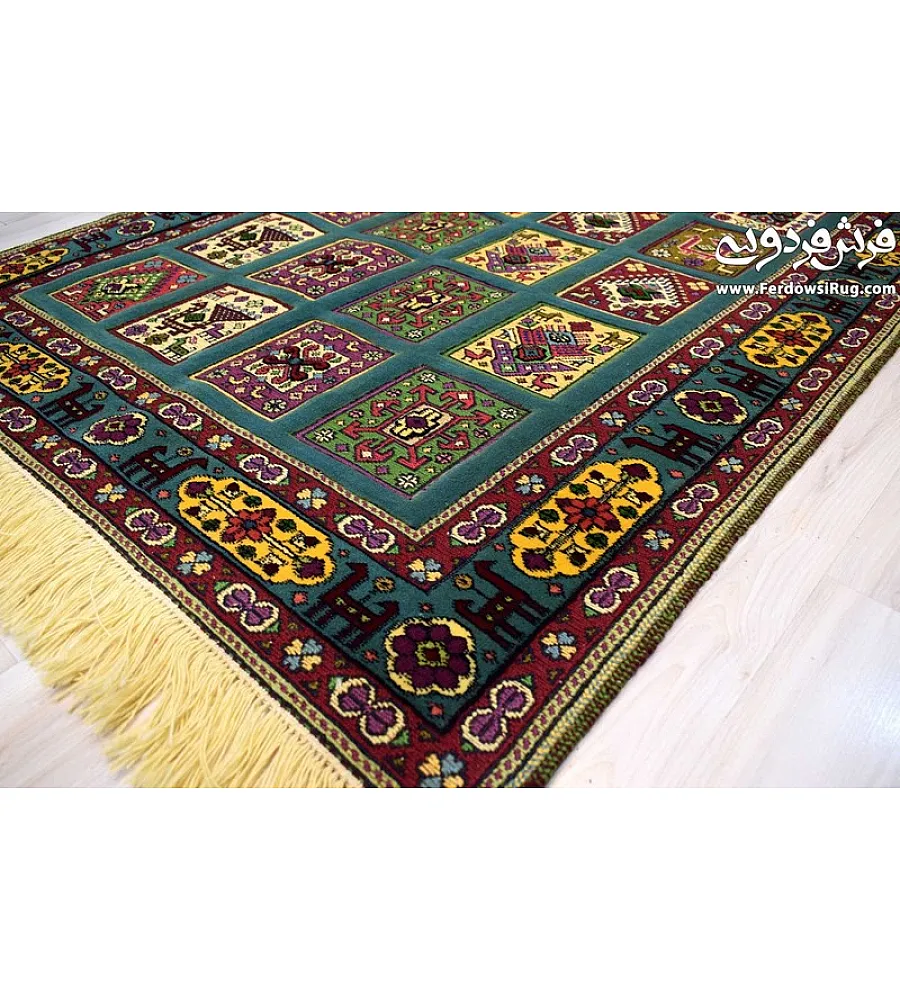 Green hand-woven clay carpet rug with intricate Mashhad texture, perfect for adding elegance and warmth to home interiors.