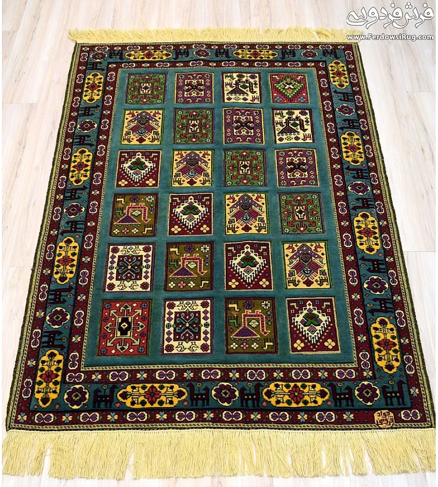 Green hand-woven clay carpet rug with intricate Mashhad texture, perfect for adding elegance and warmth to home interiors.