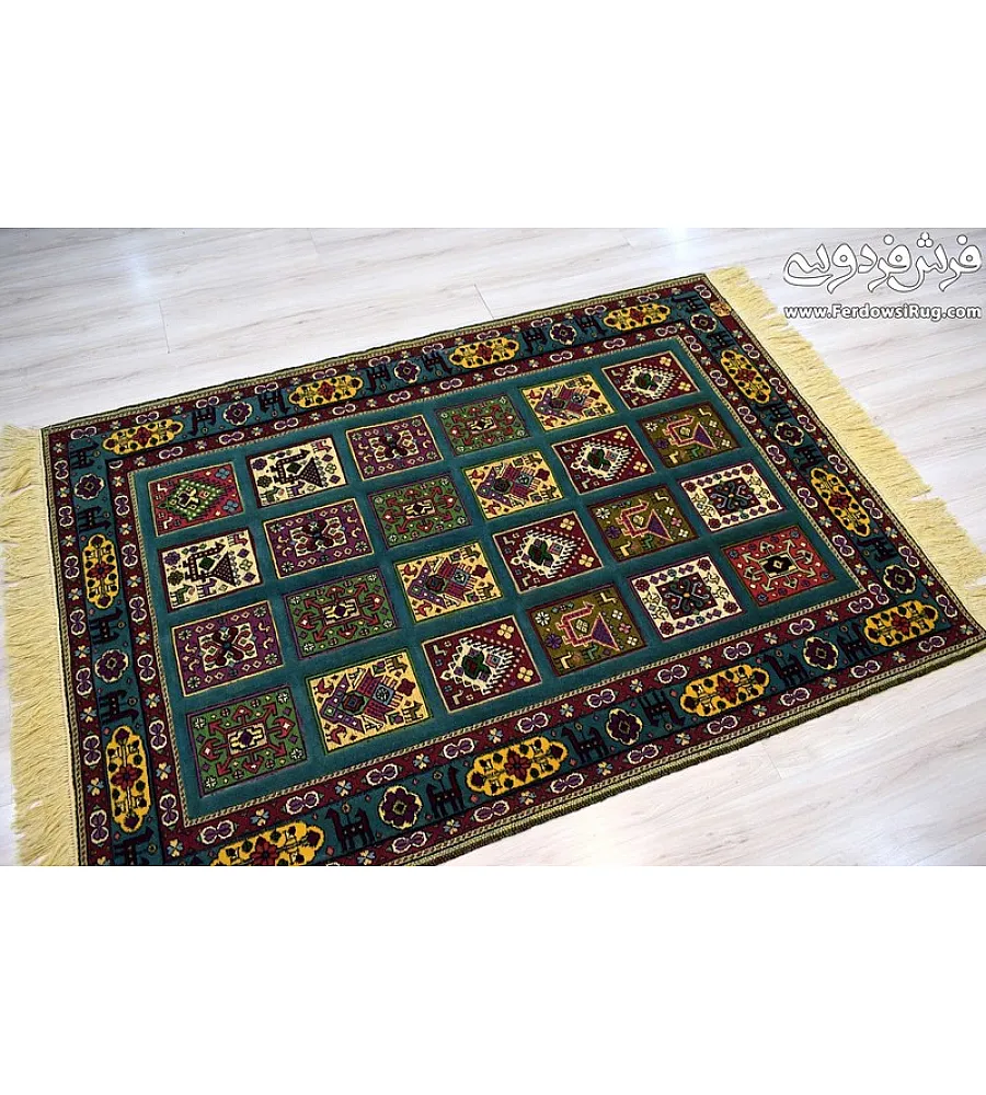 Green hand-woven clay carpet rug with intricate Mashhad texture, perfect for adding elegance and warmth to home interiors.