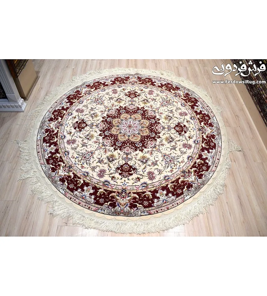 Handmade rug with circular design from Tabriz, Iran; intricate patterns, high-quality craftsmanship, perfect for home decor.